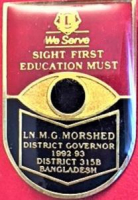 LİONS CLUP YAKA ROZET ORJİNAL METAL WE SERVE SIGHT FIRST EDUCATION MUST LN.M.G. MORSHED DISTRICT COVERNOR 1992-93 DISTRICT 315 B BANGLADESH