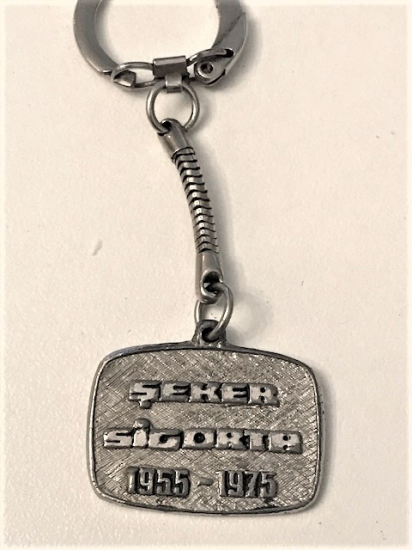 ŞEKER SİGORTA  1955 1975  20 YIL ANISINA METAL ANAHTARLIK