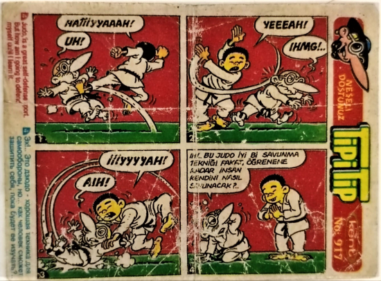  TİPİTİP SAKIZ VE CİKLET İÇERSİNDEN CIKAN YAĞLI KAGIT TÜRÜNDE RENKLİ TİFDRUK BASKI İLE KONULU MİZANSEN KARİKATÜR