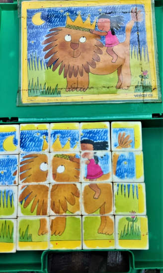 UNİCEF TARAFINDAN TASARLANIP DUNYA COCUKLARINA VERİLMİŞ YEŞİL PLASTİK KUTUSUNDA EKSİKSİZ LOGO 6 ÇEŞİT FARKLI RESİMLİ ZEKA OYUNU OYUNCAK 