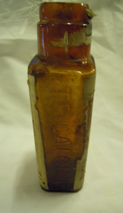 TRİCALCINE BOŞ KAHVERENGİ CAM ETİKETLİ İLAC  ŞİŞE