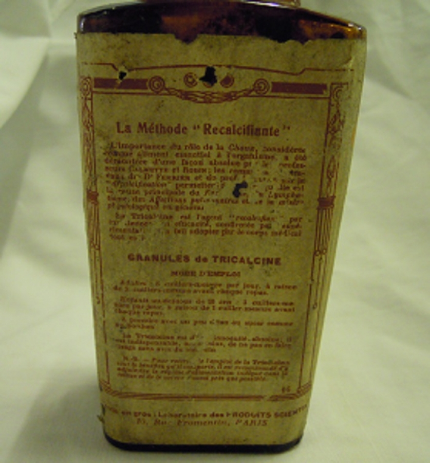 TRİCALCINE BOŞ KAHVERENGİ CAM ETİKETLİ İLAC  ŞİŞE