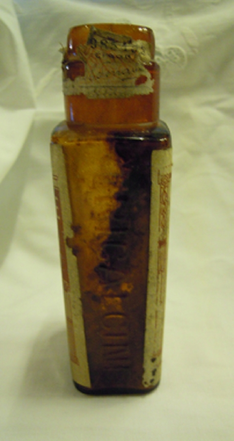 TRİCALCINE BOŞ KAHVERENGİ CAM ETİKETLİ İLAC  ŞİŞE