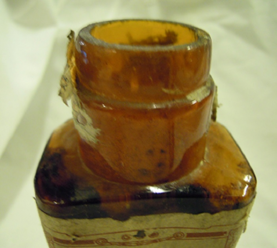 TRİCALCINE BOŞ KAHVERENGİ CAM ETİKETLİ İLAC  ŞİŞE