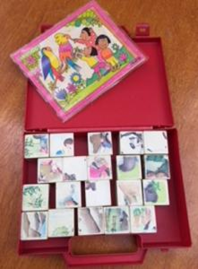 UNİCEF TARAFINDAN TASARLANIP DUNYA COCUKLARINA VERİLMİŞ KIRMIZI PLASTİK KUTUSUNDA EKSİKSİZ LOGO 6 ÇEŞİT FARKLI RESİMLİ ZEKA OYUNU OYUNCAK 