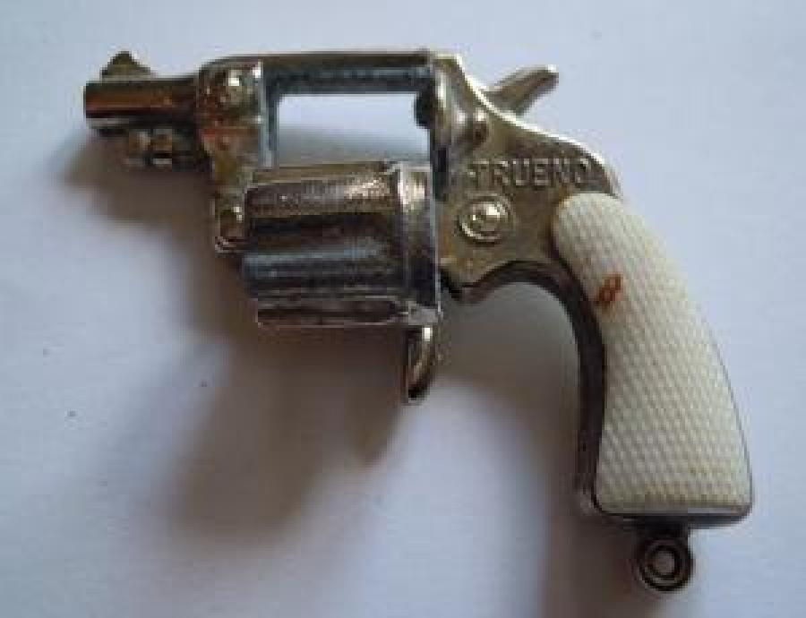 KAPSÜL PATLATAN MASKOT TOPLU METAL OYUNCAK TABANCA ANAHTARLIK 