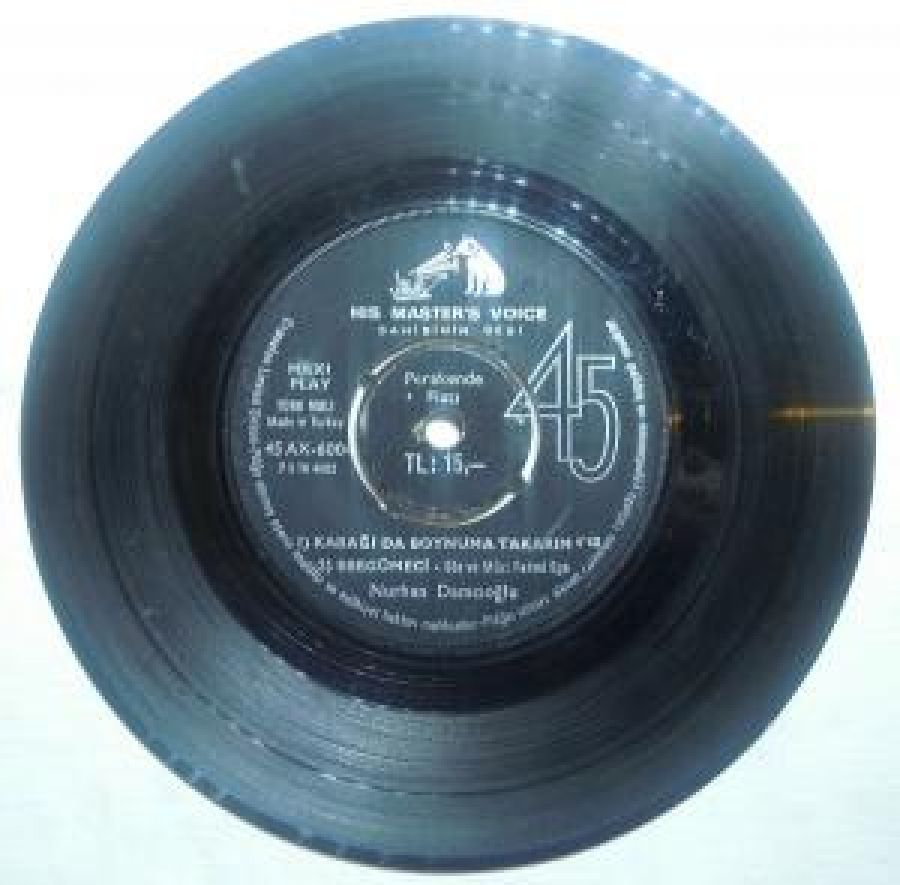 MİNİ LP NURHAN DAMCIOĞLU 1) KABAĞI DA BOYNUMA TAKARIM ; 2) EBEGÜMECİ;SÖZ VE MÜZİK : FEHMİ EGE ; 1) FINDIKKURDU ; 2) DONDURMA ; 3) SÜS SALTANAT NURHAN DAMCIOĞLU 45'LİK YERLİ PLAK 