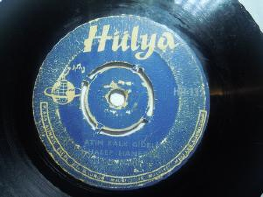 ALİ ERCAN ATIM KALK GİDELİM HALEP HANEDEN. YABAN ELLERİ 45 LİK YERLİ PLAK 