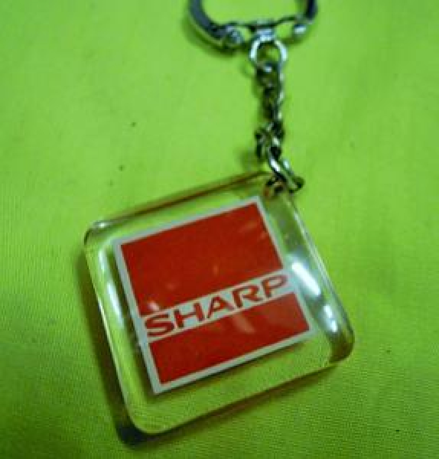SHARP JAPON ELECRONİK DEVİ POLİ KARBON ANAHTARLIK 
