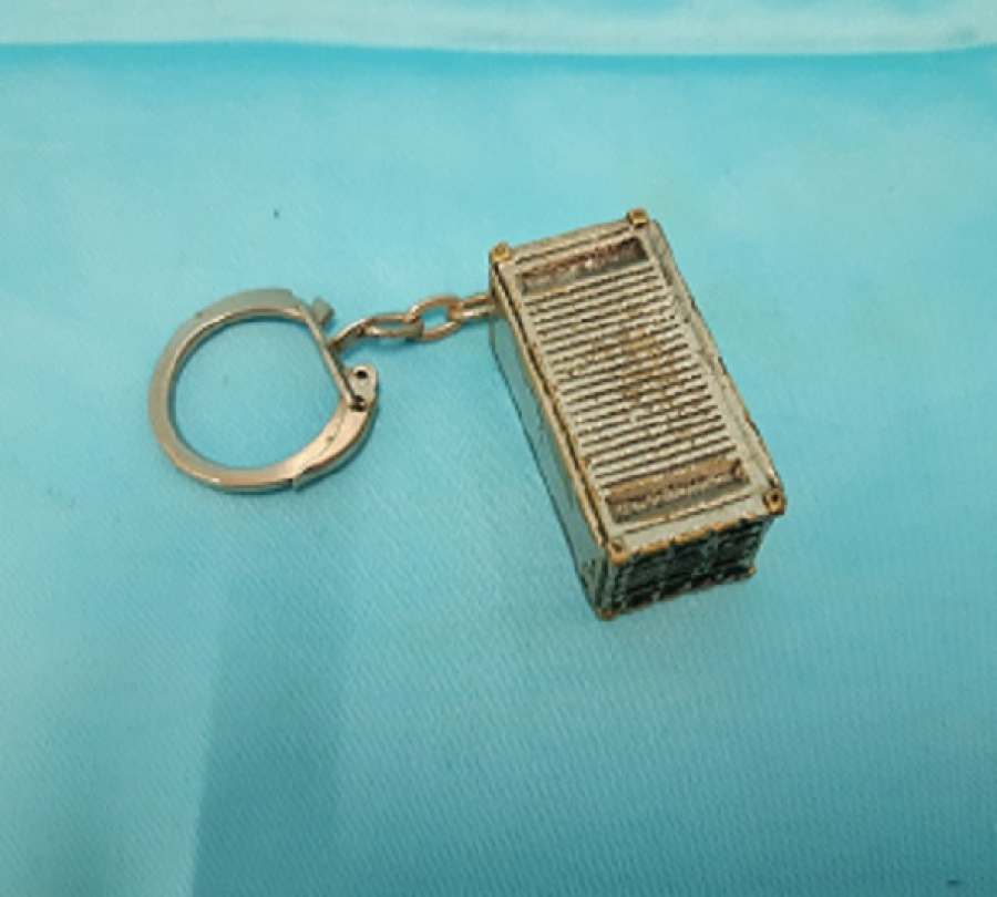 DKT DÜNYAYI BİZ TAŞIYORUZ METAL KONTEYNER ANAHTARLIK 