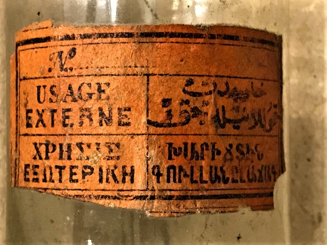 OSMANLI ŞİŞE 4 DİLDE YAZILMIŞ ETİKETLİ CAM MANTAR KAPAKLI İLAC ŞİŞESİ 100 CC 