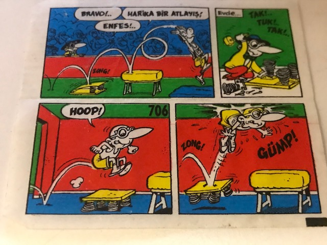  TİPİTİP SAKIZ VE CİKLET İÇERSİNDEN CIKAN YAĞLI KAGIT TÜRÜNDE RENKLİ TİFDRUK BASKI İLE KONULU MİZANSEN KARİKATÜR