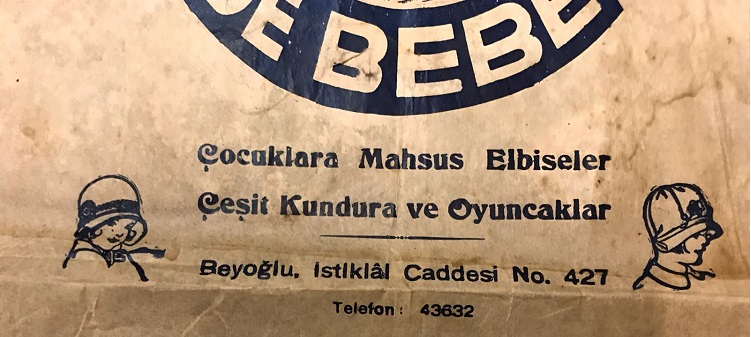 BEYOĞLU PAZAR DE BEBE  COCUKLARA MAHSUS ELBİSELER  ÇEŞİT KUNDURA VE OYUNCAKLAR AMBALAJ KAĞIDI