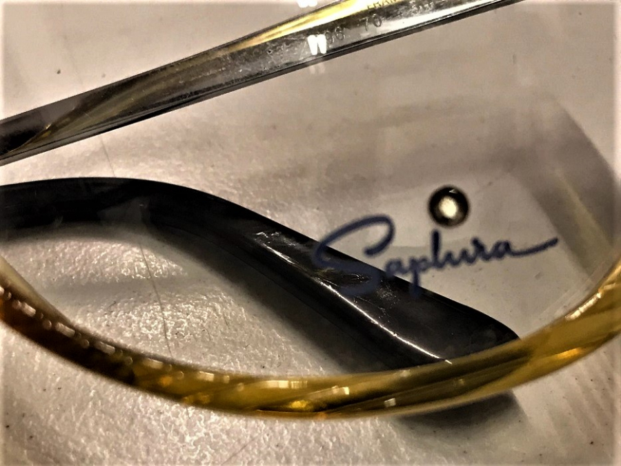 KULLANILMAMIŞ 1980 SAPHİRA CREAZIONE FEMMINILE  FRAME AUSTRIA TEK TAŞLI BEYAZ VE BAL RENKLİ BAYAN GÖZLÜK NUMARASIZ CAMLIDIR