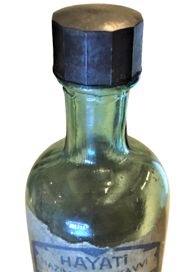 POLYOPOCALCIA ŞURUBU HAYATI NAZIM VE MUKAVVİ ŞURUP BAKALIT KAPAKLI YEŞİL CAM ŞİŞE 2 DİLDE ACIKLAMA ETİKETLİ İLAC ŞİŞESİ