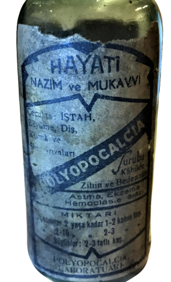 POLYOPOCALCIA ŞURUBU HAYATI NAZIM VE MUKAVVİ ŞURUP BAKALIT KAPAKLI YEŞİL CAM ŞİŞE 2 DİLDE ACIKLAMA ETİKETLİ İLAC ŞİŞESİ