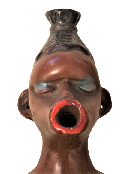 ZENCİ ARAP KULLÜK ALCIDAN YAPILMA ÜZERİ EL BOYAMA İÇERSİNDEKİ SİGARANIN DUMANINI AGZINDAN CIKARAN