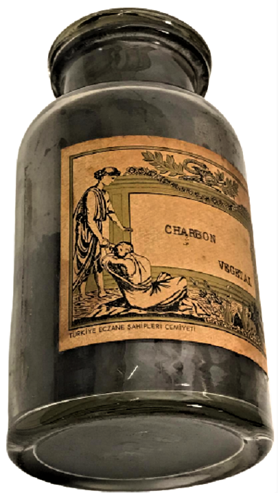 1950 CHARBON VEGETAL CAM KAPAKLI ŞİŞE ÜZERİ ETİKETLİ  İÇERSİ DOLU İLAC YAPIM ECZA ŞİŞESİ
