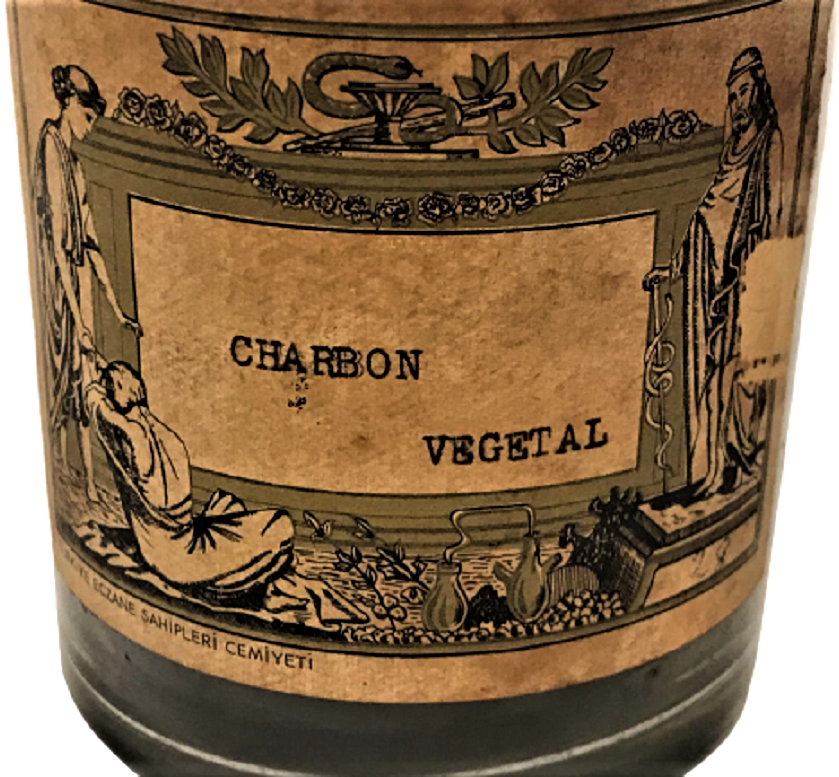 1950 CHARBON VEGETAL CAM KAPAKLI ŞİŞE ÜZERİ ETİKETLİ  İÇERSİ DOLU İLAC YAPIM ECZA ŞİŞESİ