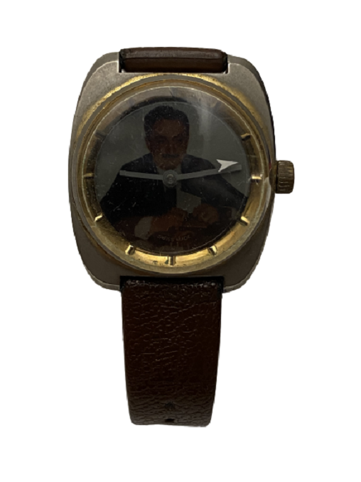 SWISS MADE İN KURMALI MEKANİK KADRANINDA ECEVİTİN FOTOĞRAFI VARDIR HER DAKIKA SİLİNİP TEKRAR GELMEKTEDİR KOL SAATİ