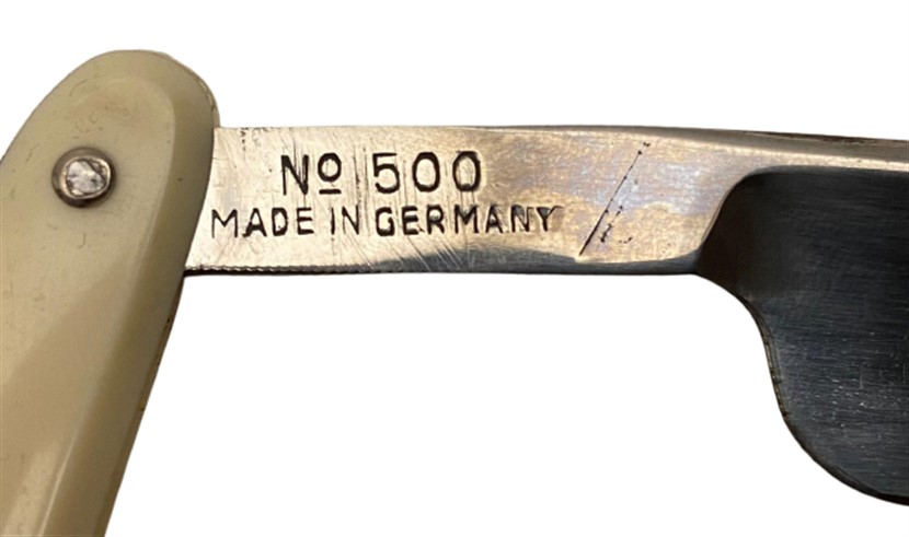 1950 ORİJİNAL KENDİ KUTUSUNDA KULLANILMAMIŞ 0 EXTRA HOLLOW GROUND FULLY WARRANTED BEYAZ BAKALİT SAPLI USTURA