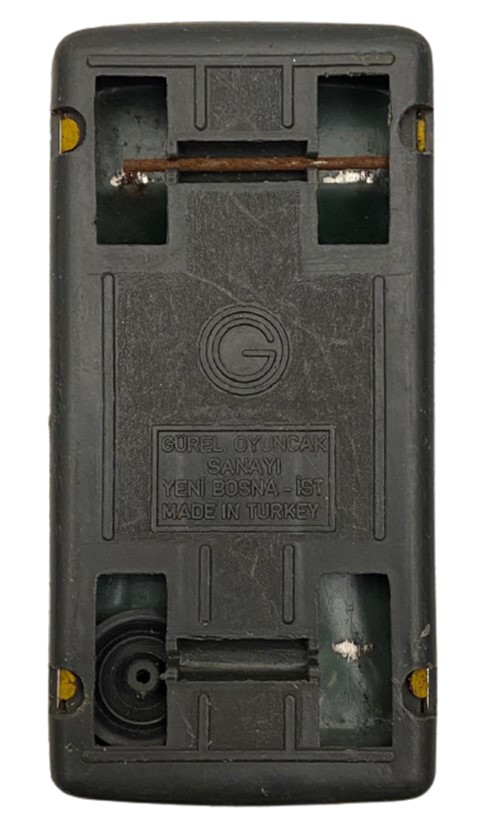 GÜREL TÜRK MALI SARI RENKDE TENEKE ALT KISMI PLASTİK OYUNCAK TOFAŞ DOĞAN TAKSİM YEŞİLKÖY DOLMIŞ OYUNCAK TAKSİ