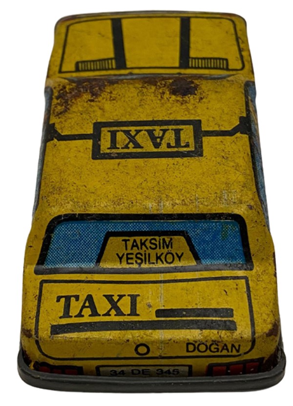 GÜREL TÜRK MALI SARI RENKDE TENEKE ALT KISMI PLASTİK OYUNCAK TOFAŞ DOĞAN TAKSİM YEŞİLKÖY DOLMIŞ OYUNCAK TAKSİ