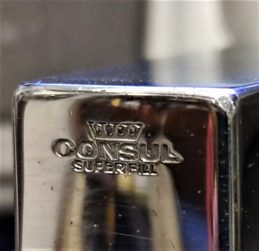 CONSUL SUPER FİLL LİGHTER  DIŞ KISMI GÜMÜŞ KAPLAMA  67,46 GR MASA SEHBA ÜZERİ CAKMAK