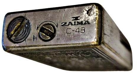 ZAIMA  C-48 LİGHTER ÜZERİ MİTOLOJIK RESİMLİ ÜZERİ GÜMÜŞ KAPLAMA TAŞLI GAZLI CAKMAK