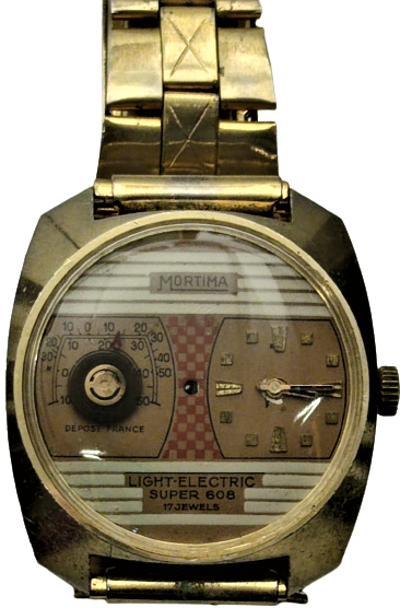 1970 MORTİMA LIGHT ELECTRIC SUPER 608 CLOAK KOL SAATİ KADRAN ORTADA LAMBA SOLDA DERECE SAGDA KURMALI MEKANİK KOLEKSİYON SAAT