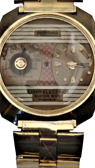 1970 MORTİMA LIGHT ELECTRIC SUPER 608 CLOAK KOL SAATİ KADRAN ORTADA LAMBA SOLDA DERECE SAGDA KURMALI MEKANİK KOLEKSİYON SAAT