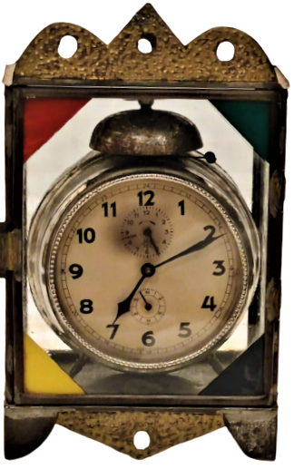 OSMANLI GELİN SAATİ ÖZEL EL YAPIM TENEKE VE CAMDAN YAPILMIŞ  KAPAKLI DOLABİNDA TEK CANLI JUNKERS KURMALI MEKANİK SAATİYLE 