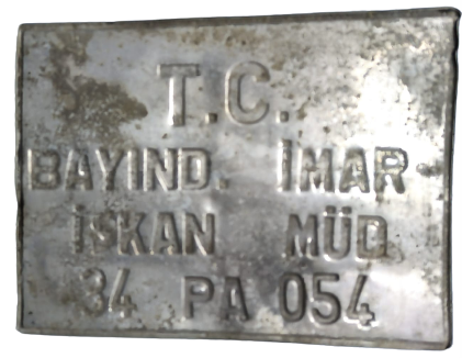 ARACLARIN ŞEHİR İÇERSİNDE CALIŞMASI İÇİN ALINAN MUSADE İLE BASTIRILAN PLAKA  TÜRKİYE CUMHURİYETİ BAYINDIR İMAR İSKAN MUDÜRLÜĞÜ