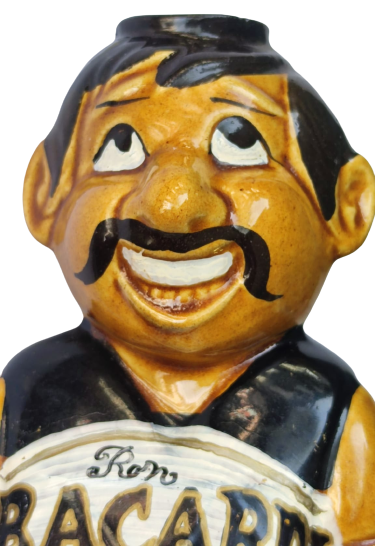 ROM BACARDİ ANEJO ANTİQUE  OTURAN MEKSİKALI YÖRESEL KIYAFETLİ ADAM FİGURÜ MANTAR TIPALI RENKLİ SERAMİK ŞİŞE