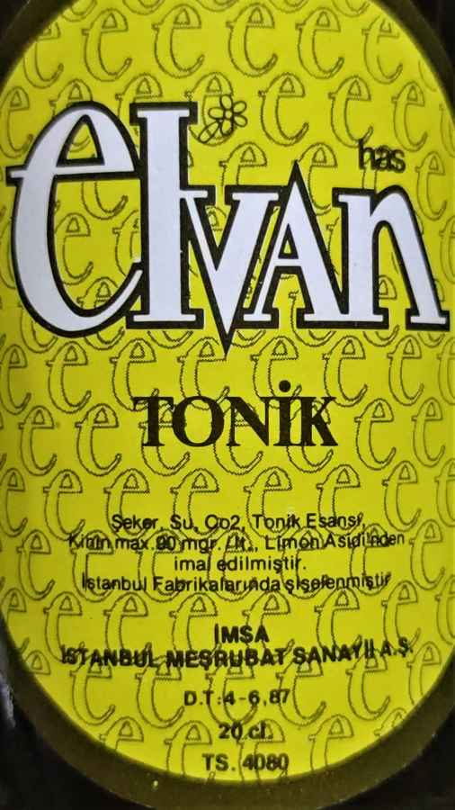 1987 DOLUM TARİHLİ  HAS ELVAN TONIK METAL KAPAK KAPAGI ACILMAMIŞ SEFFAF CAM SİŞEDE 20 CL KAPAGI UZERİNDE