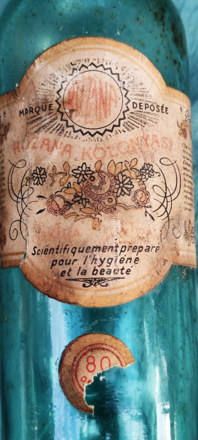 CUMHURİYET BAŞLARI ROZONA KOLONYASI MARQUE DEPOSEE 80 DERECE BAKALIT CEVİRME KAPAKLI BOŞ KOLONYA CAM SİŞE