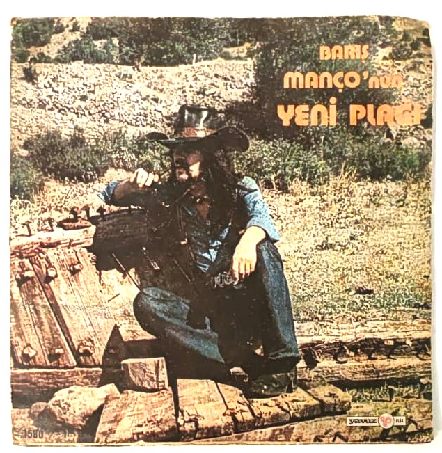 1976 BARIS MANCO NUN YENİ PLAGI  REZİL DEDE VUR HA VUR HA VUR ORJINAL KENDİ KABINDA 45 LİK PLAK