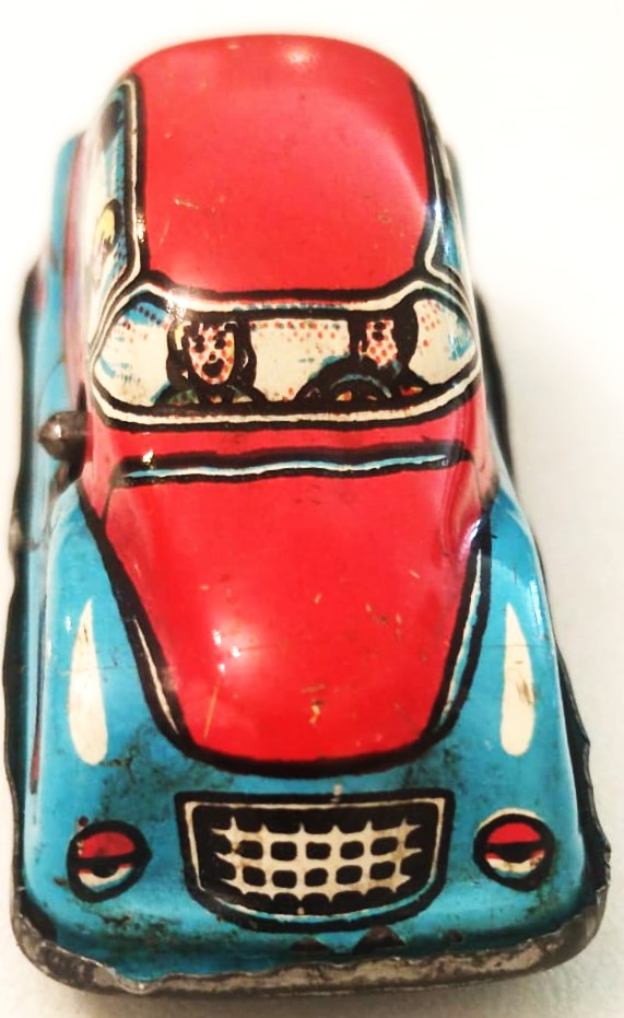 1940 RAYDA GİDEN KURMALI TENEKE AMERİKAN OYUNCAK OTO