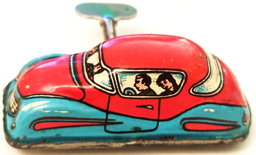 1940 RAYDA GİDEN KURMALI TENEKE AMERİKAN OYUNCAK OTO