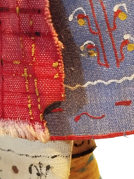 YUN EGİREN ELİNDE KIRMAN CEVİREN YORESEL KIYAFETLİ KOYLU KADINI