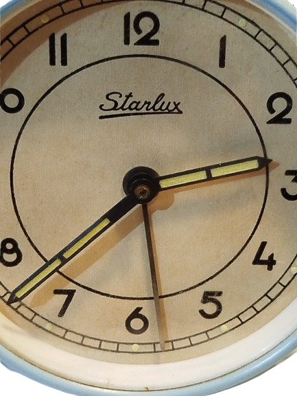STARLUX MEKANİK KURMALI CALARLI MASA SAATİ UCUK MAVİ RENK KASA FOSFORLU KADRAN