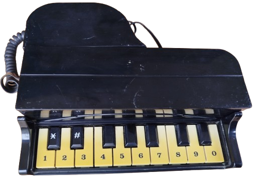 PİYANO FONMUNDA TASARLANMIS TELEFON TUSLARINA BASILARAK ARAMA YAPMAKTADIR