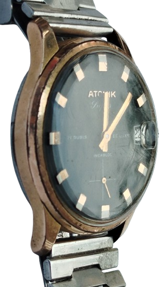 ATOMİK 17 RUBIS DELUXE INCABLOC TAKVİMLİ KURMALI KOL SAATİ METAL KORDON DAKİK CALISMAKTA