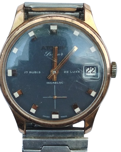 ATOMİK 17 RUBIS DELUXE INCABLOC TAKVİMLİ KURMALI KOL SAATİ METAL KORDON DAKİK CALISMAKTA