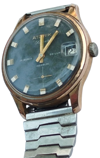 ATOMİK 17 RUBIS DELUXE INCABLOC TAKVİMLİ KURMALI KOL SAATİ METAL KORDON DAKİK CALISMAKTA