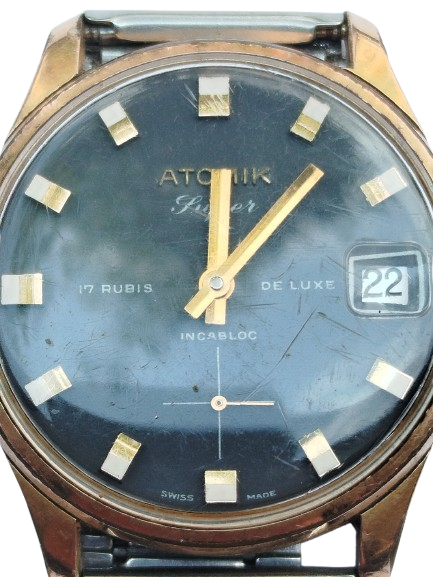 ATOMİK 17 RUBIS DELUXE INCABLOC TAKVİMLİ KURMALI KOL SAATİ METAL KORDON DAKİK CALISMAKTA