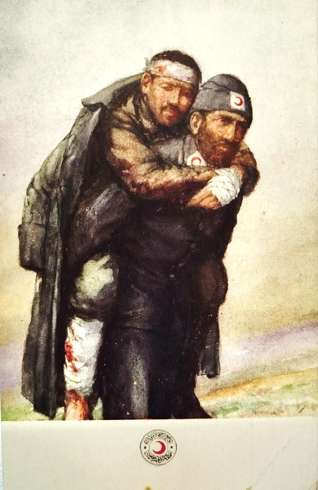 OSMANLI HİLALİAHMER KIZILAY KARTPOSTAL CEPHEDE YARALI ASKERİ SIRTINDA TASIYAN ASKER