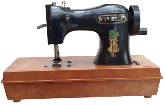 1975 HOLLY HOBBIE DURHAM INDUSTRIES INC MİKA MEKANIK OYUNCAK KOLLU  DİKİS MAKİNASI