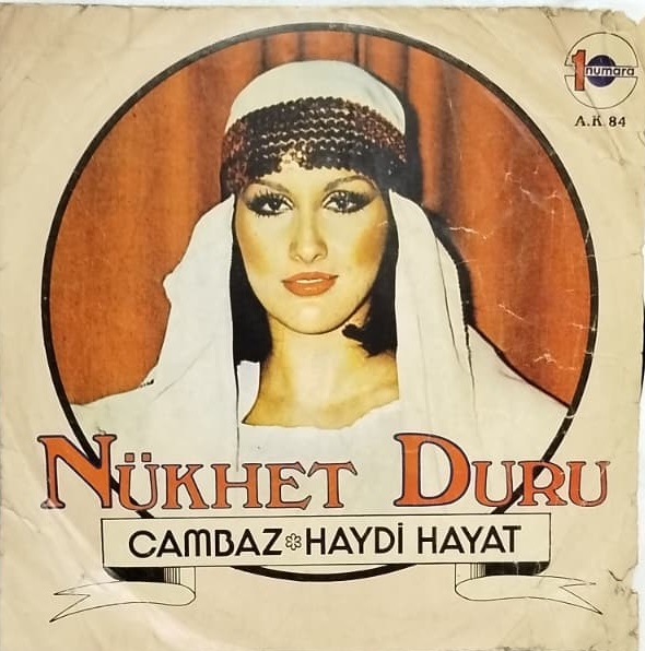 1977 NÜKHET DURU CAMBAZ HAYDİ HAYAT ORİJİNAL ANALOG BASKI DÖNEM 45 LİK PLAK