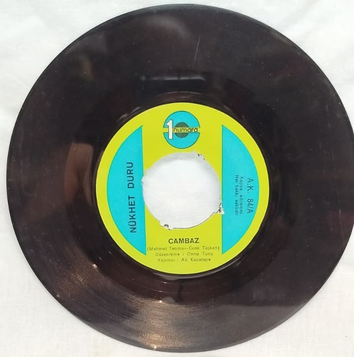 1977 NÜKHET DURU CAMBAZ HAYDİ HAYAT ORİJİNAL ANALOG BASKI DÖNEM 45 LİK PLAK